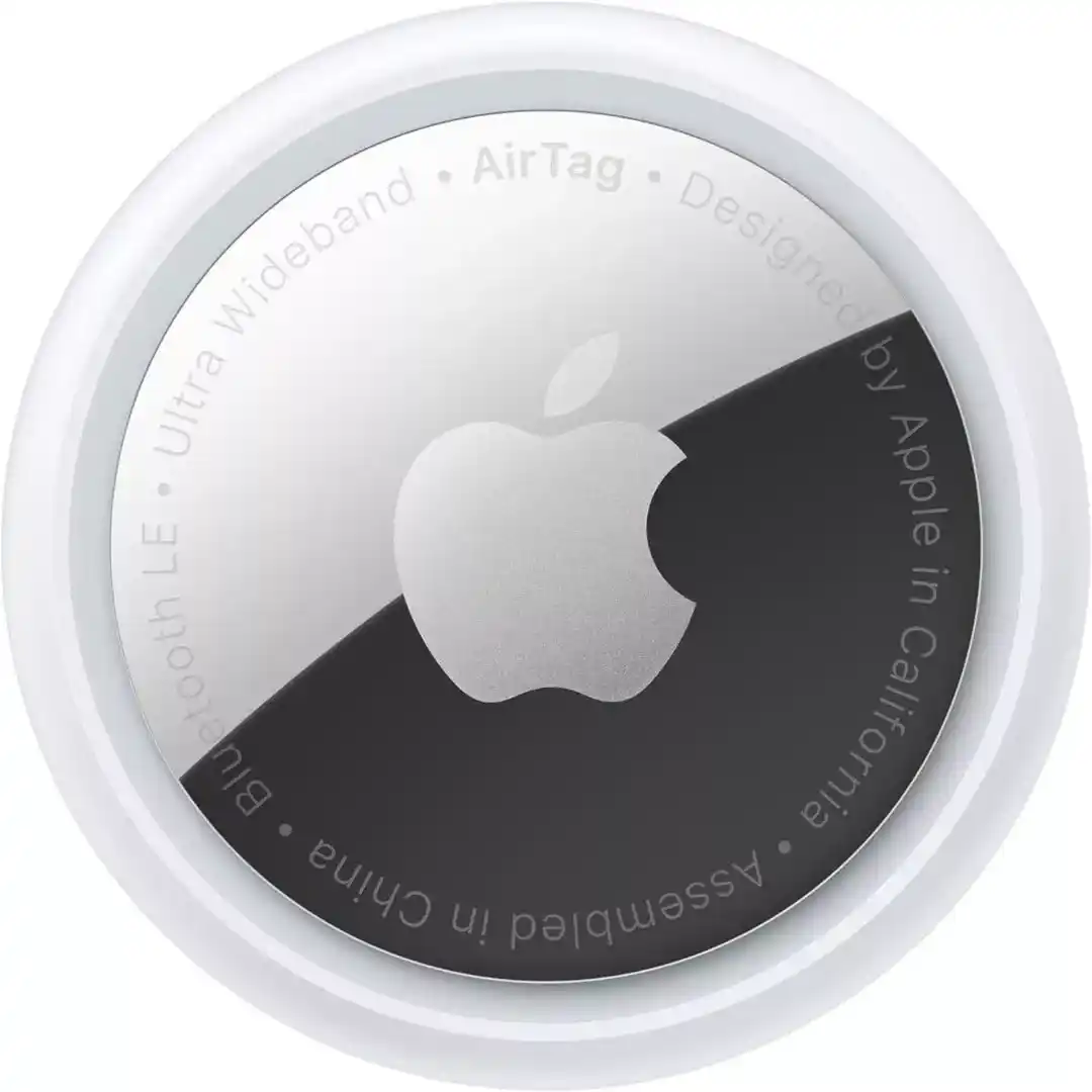 White Apple AirTag with its polished steel front facing the camera.
